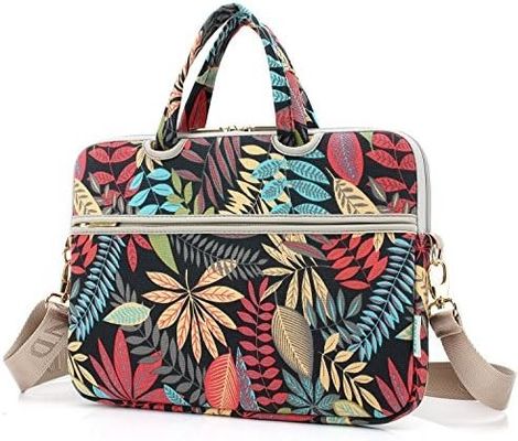 Bolso para portátil diseñado para portátiles de 12,5 a 14 pulgadas con interior acolchado de tela de lona estampada y múltiples opciones de transporte