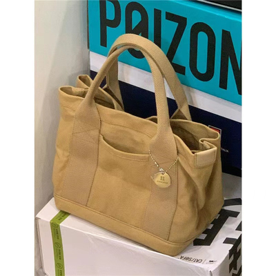 2024 Nuevo diseño de alta gama de lienzos de bolso completo bolso femenino de moda de toda la antigüedad bolso de hombro único de cuerpo cruzado