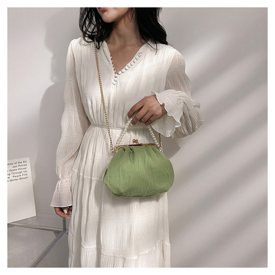 2024 NUEVO RETRO FAIRY SOLID COLOR PEQUEÑO BORSA BLANCA BORSA PERLA de mano de mujer de hilo de red en un simple bolso de cuerpo cruzado