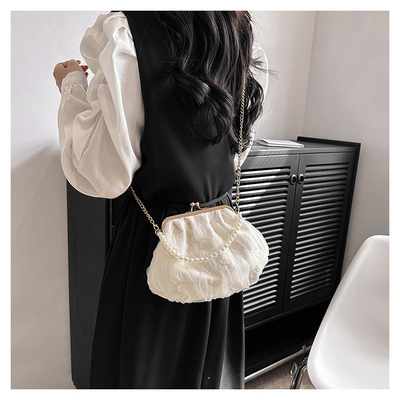 2024 NUEVO RETRO FAIRY SOLID COLOR PEQUEÑO BORSA BLANCA BORSA PERLA de mano de mujer de hilo de red en un simple bolso de cuerpo cruzado