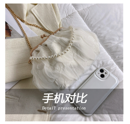 2024 NUEVO RETRO FAIRY SOLID COLOR PEQUEÑO BORSA BLANCA BORSA PERLA de mano de mujer de hilo de red en un simple bolso de cuerpo cruzado