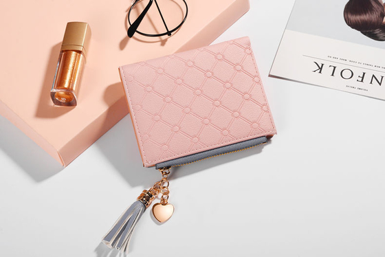 La versión coreana de la nueva cartera corta de mujeres cartera corta de color de flexión cartera corta de franjas de cremallera de monedas de múltiples tarjetas cartera en stock