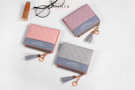 La versión coreana de la nueva cartera corta de mujeres cartera corta de color de flexión cartera corta de franjas de cremallera de monedas de múltiples tarjetas cartera en stock