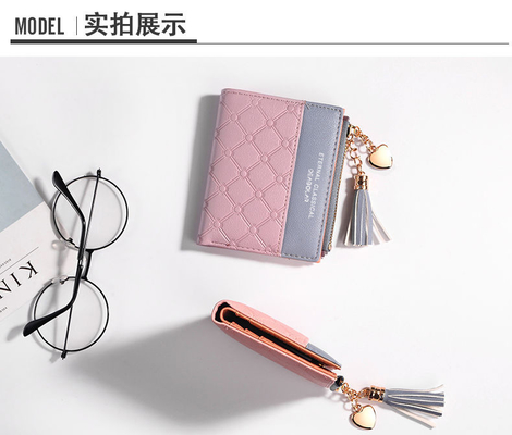 La versión coreana de la nueva cartera corta de mujeres cartera corta de color de flexión cartera corta de franjas de cremallera de monedas de múltiples tarjetas cartera en stock