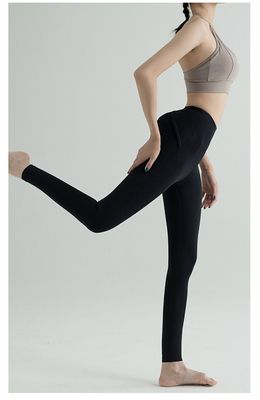 Nuevos pantalones de yoga de cintura alta mujeres Europa y los EE.UU. ejercicios de cadera de melocotón velocidad de carrera apretada ropa de yoga seca cuello