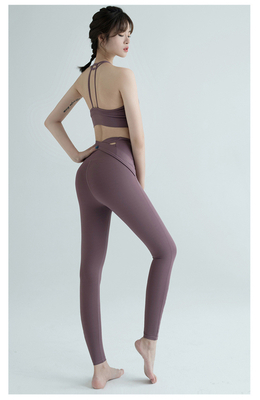 Nuevos pantalones de yoga de cintura alta mujeres Europa y los EE.UU. ejercicios de cadera de melocotón velocidad de carrera apretada ropa de yoga seca cuello