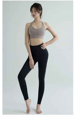 Nuevos pantalones de yoga de cintura alta mujeres Europa y los EE.UU. ejercicios de cadera de melocotón velocidad de carrera apretada ropa de yoga seca cuello