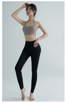 Nuevos pantalones de yoga de cintura alta mujeres Europa y los EE.UU. ejercicios de cadera de melocotón velocidad de carrera apretada ropa de yoga seca cuello