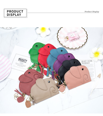 PRIMERA capa de piel de vaca bolso de monedas de mujer nuevo elefante creativo de llave cerradura bolsa de cuero bolsa de llave bolsa de monedas