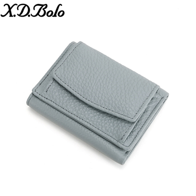 PULSO ANTIROBO de cuero de mujer cartera de tarjeta corta bolsa de tres plegados cartera pequeña RFID MINI de piel de vaca moneda cartera transfronteriza
