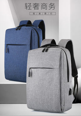 Fabrica al por mayor Mochila portátil de interior de nylon impermeable con cierre de cremallera Mochila portátil de nylon impermeable con interfaz USB